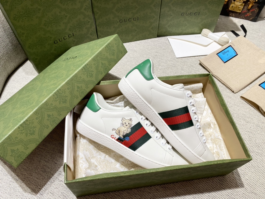 G*u*i sneakers