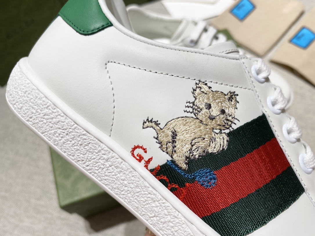G*u*i sneakers
