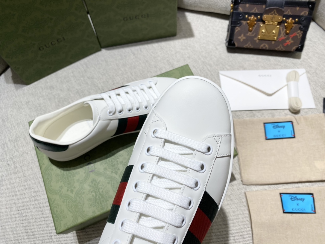 G*u*i sneakers