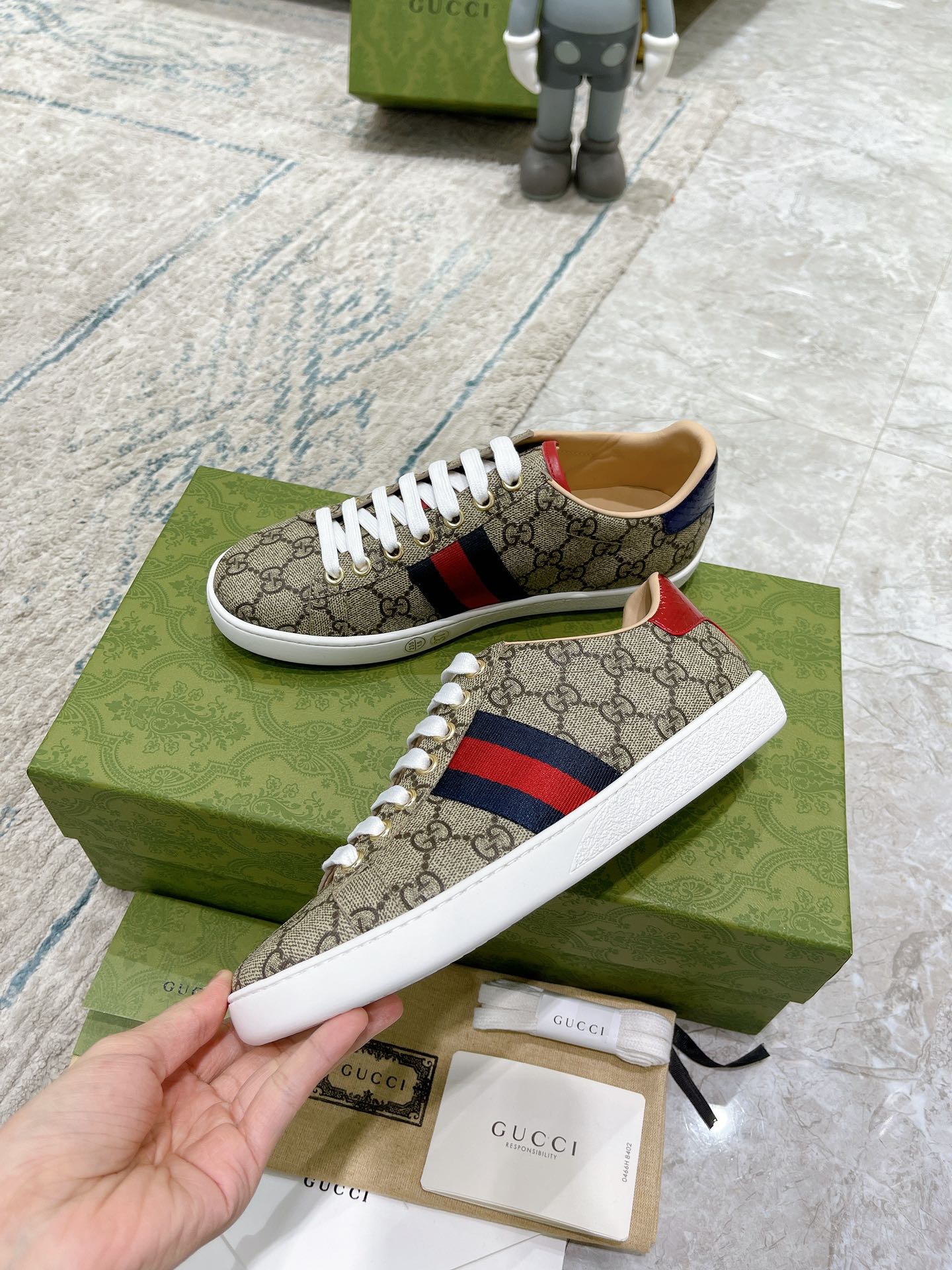 G*u*i sneakers
