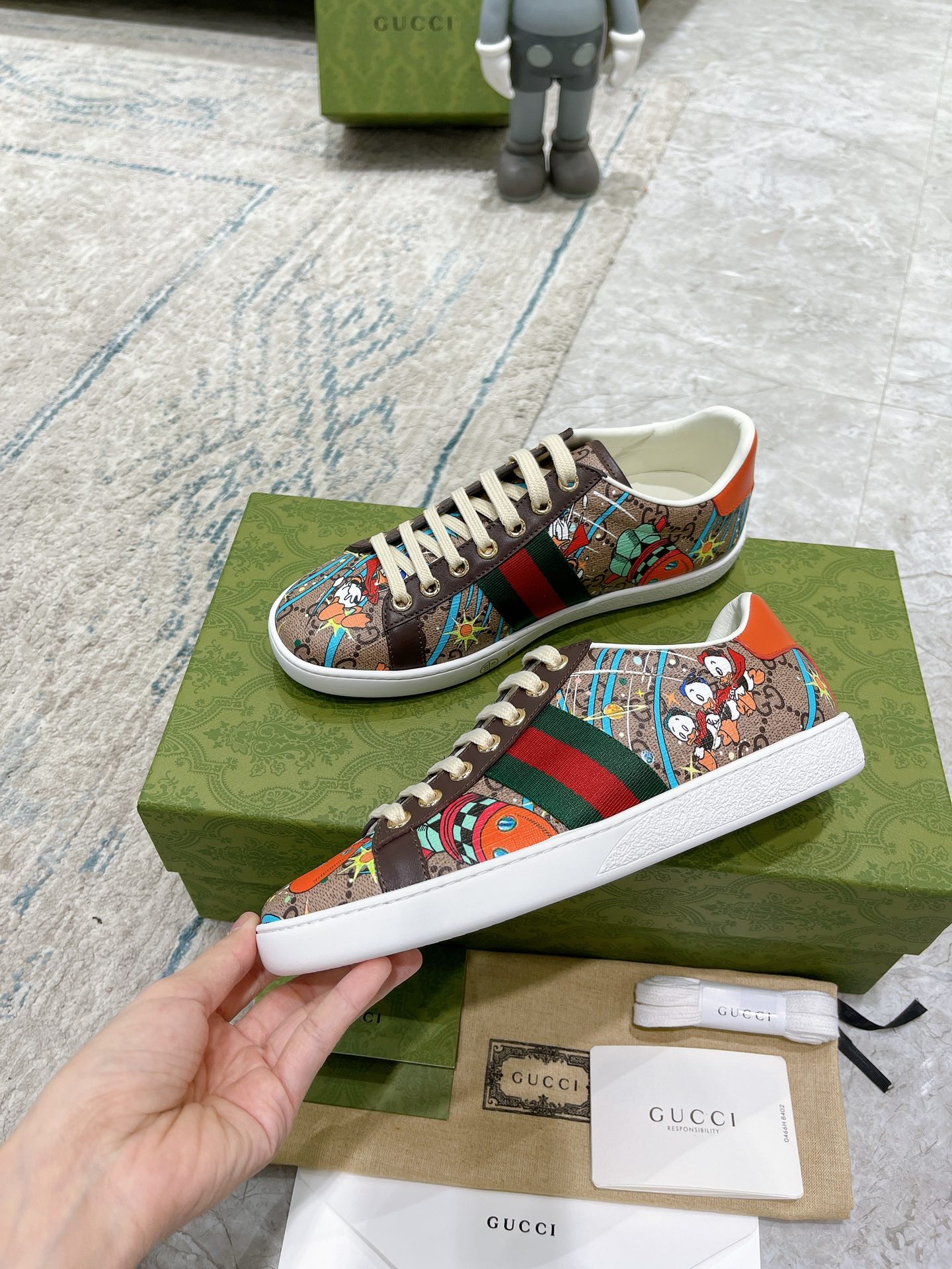 G*u*i sneakers
