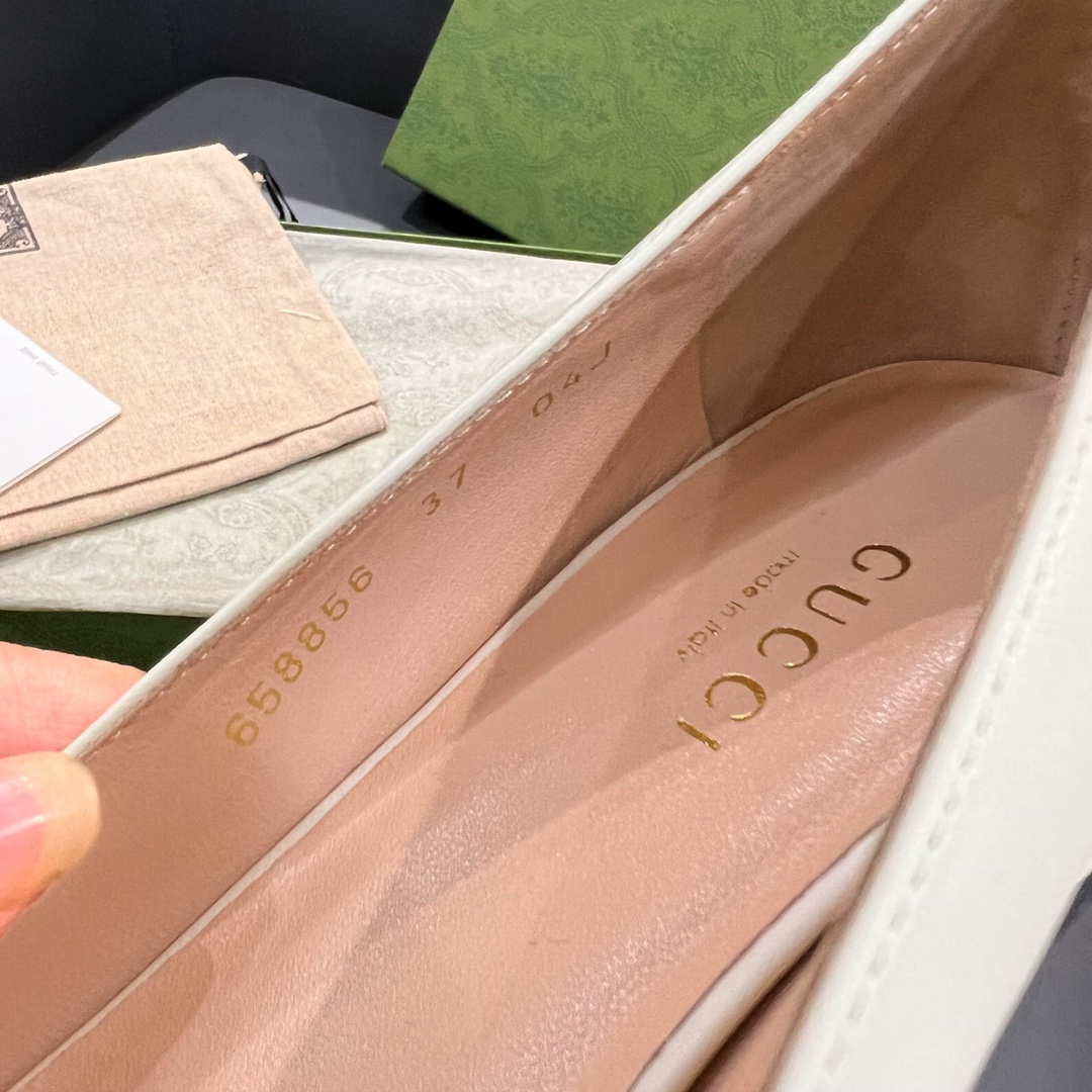 G*u*i loafers