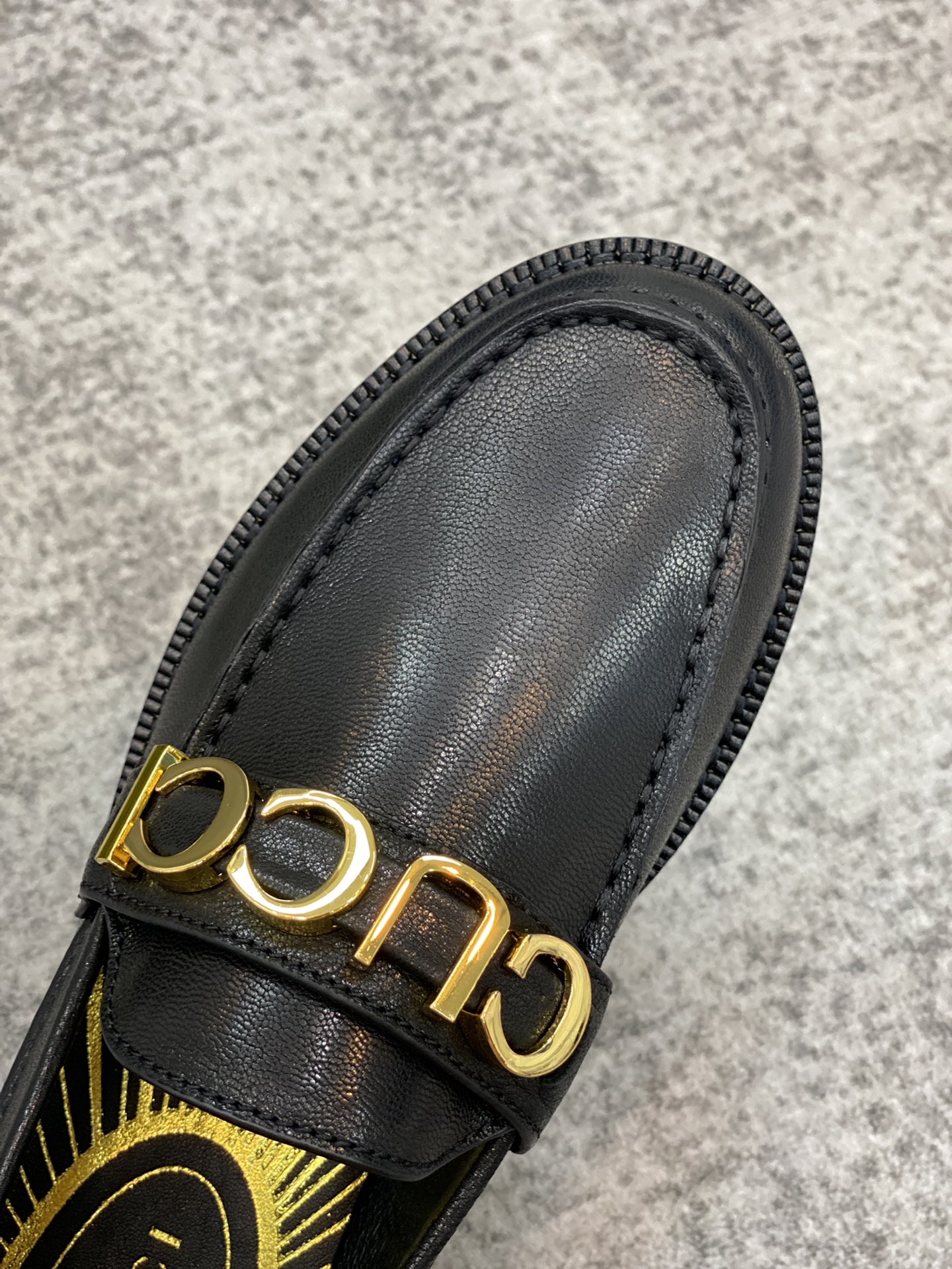 G*u*i loafers