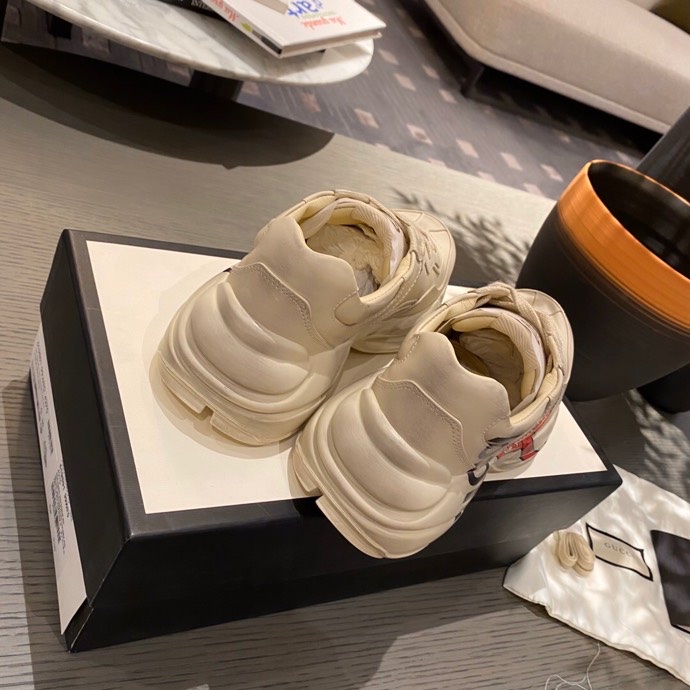 G*u*i sneakers