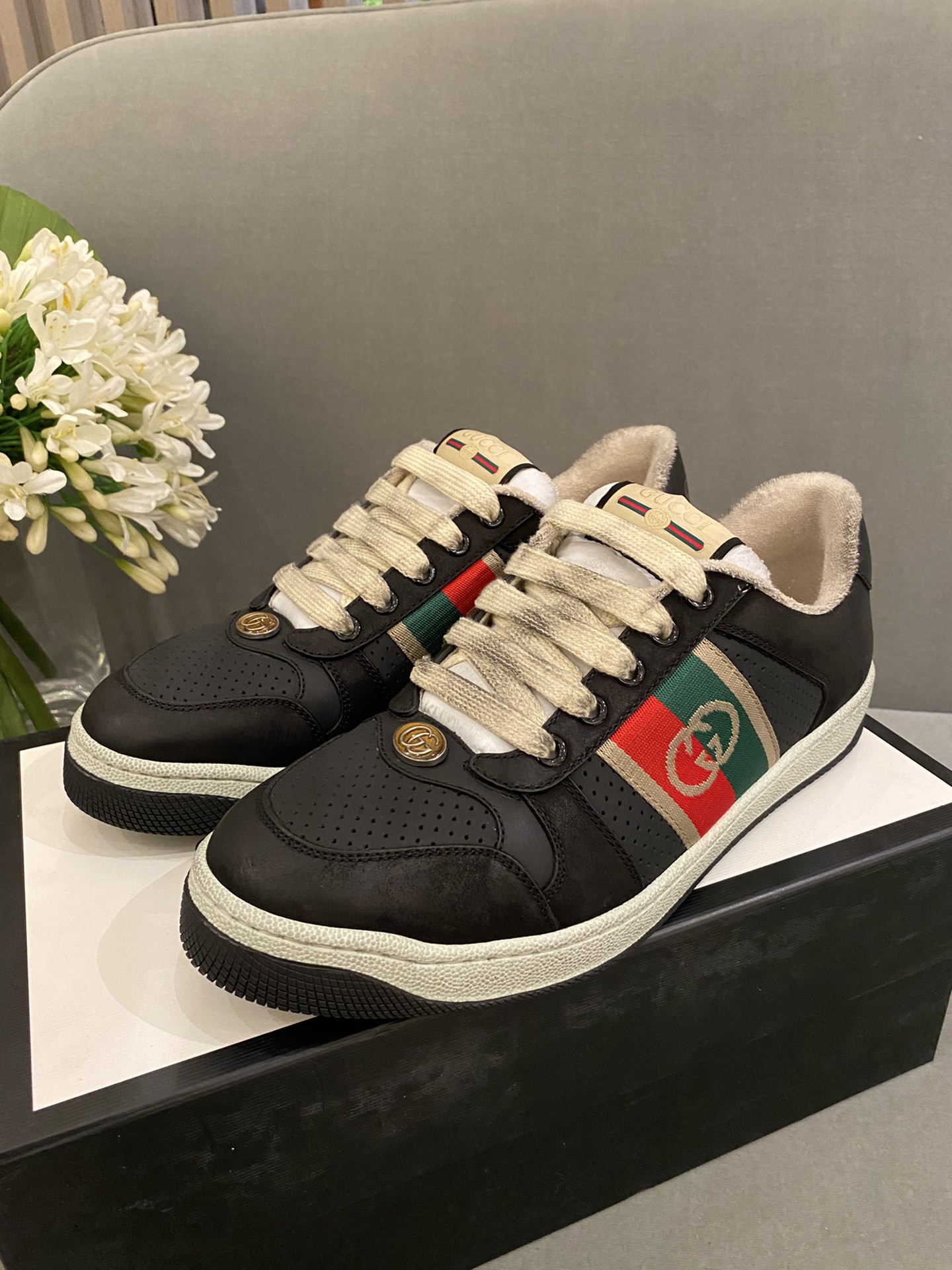 G*u*i sneakers