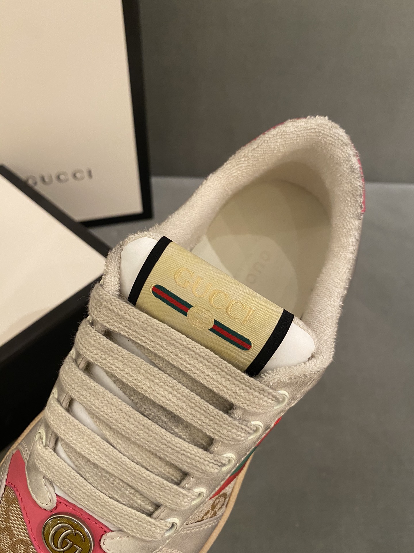 G*u*i sneakers