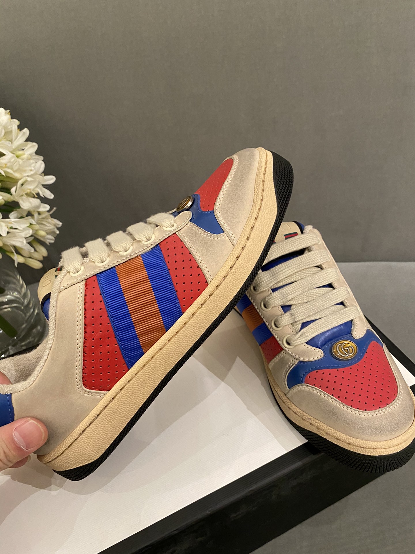 G*u*i sneakers