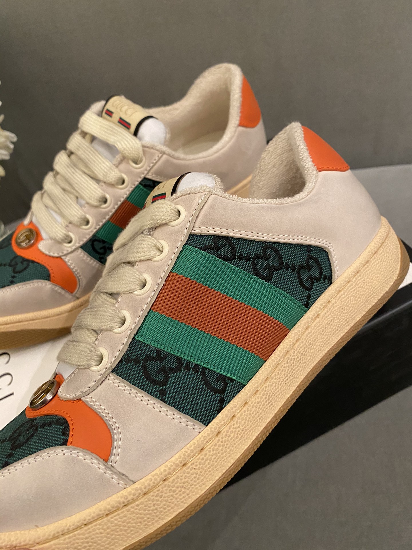 G*u*i sneakers