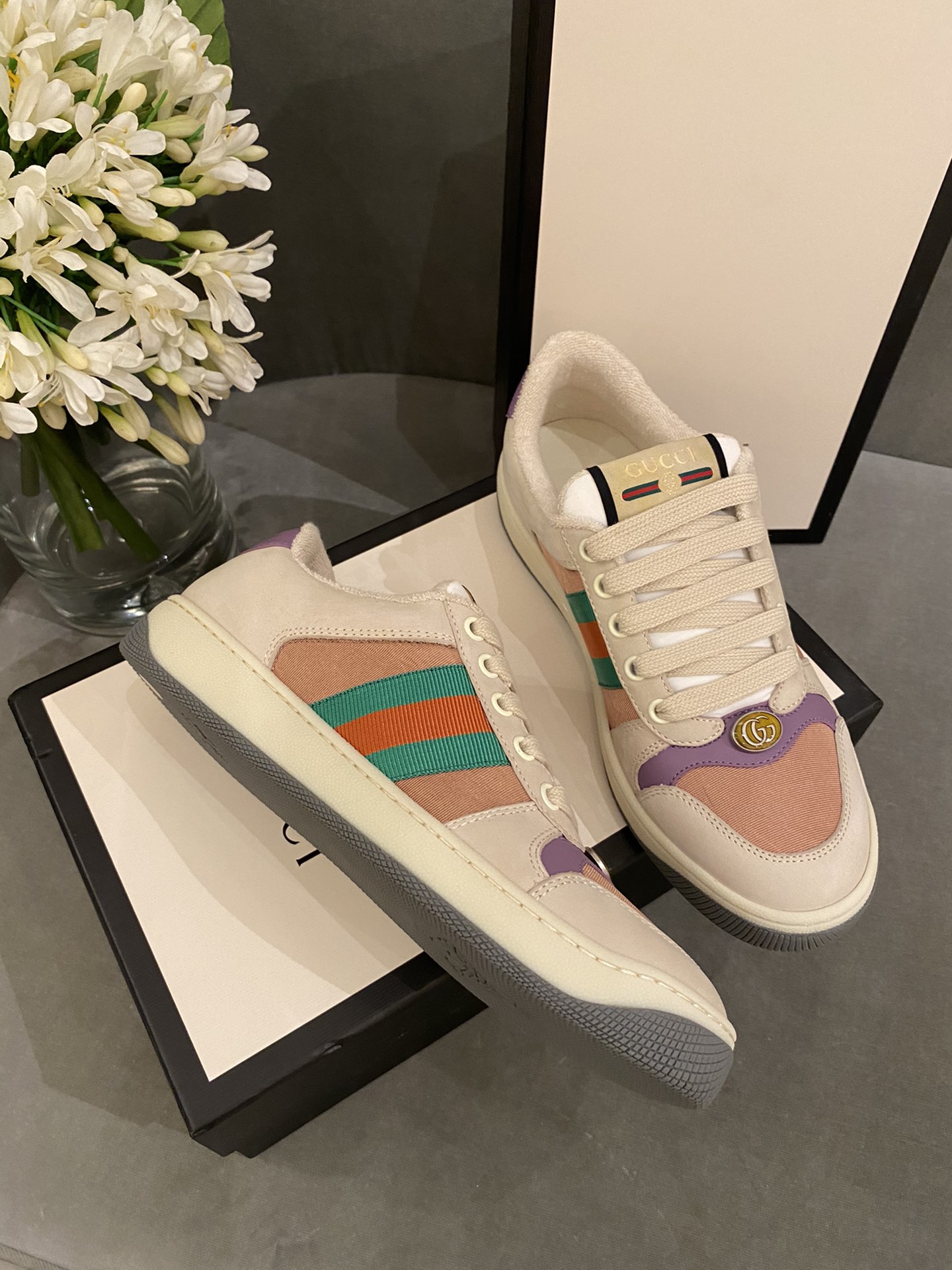 G*u*i sneakers