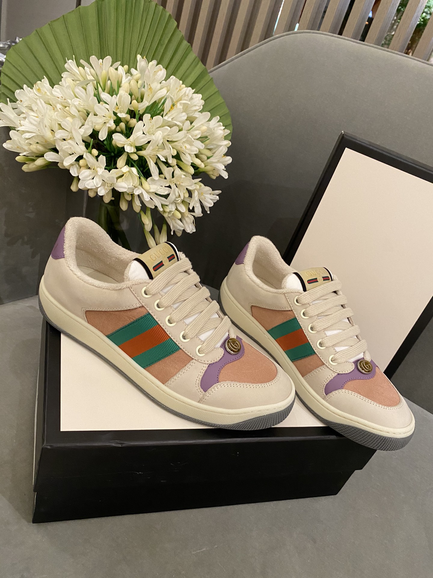 G*u*i sneakers