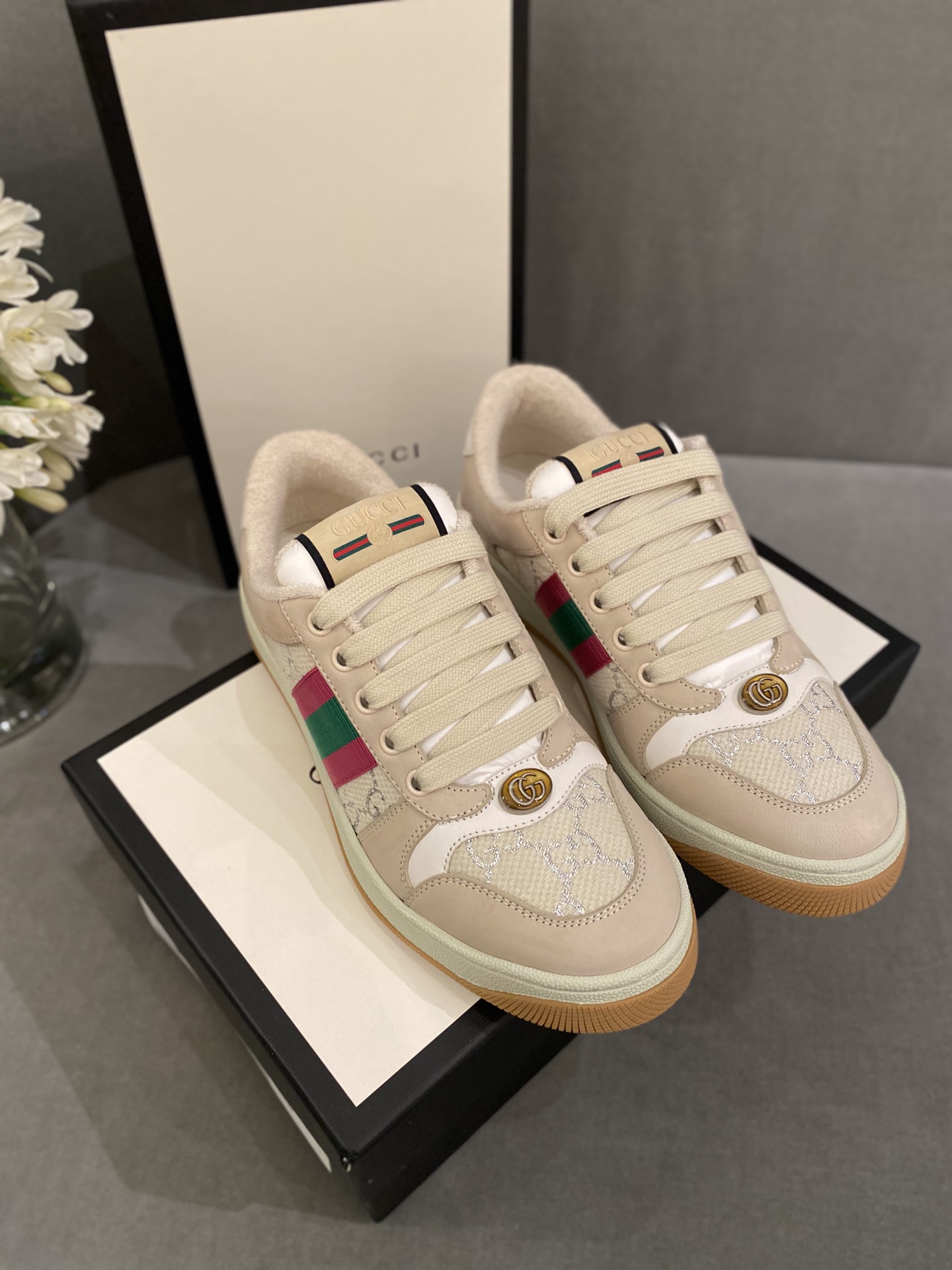 G*u*i sneakers