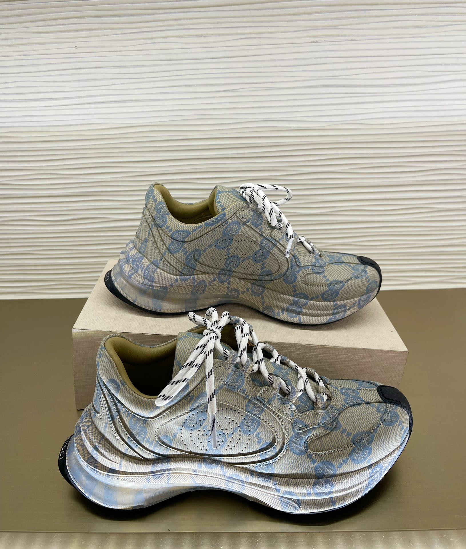 G*u*i sneakers