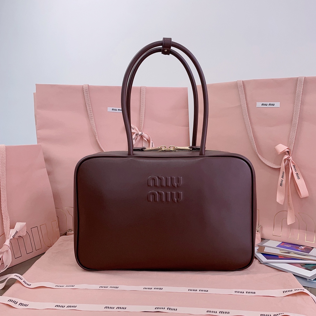 M*um*u leather top handbag-34x23x12cm