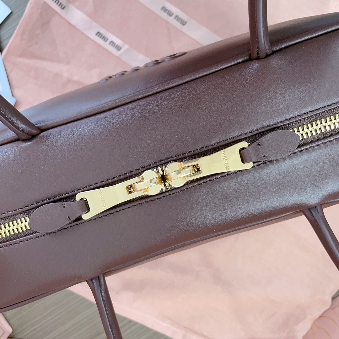 M*um*u leather top handbag-34x23x12cm