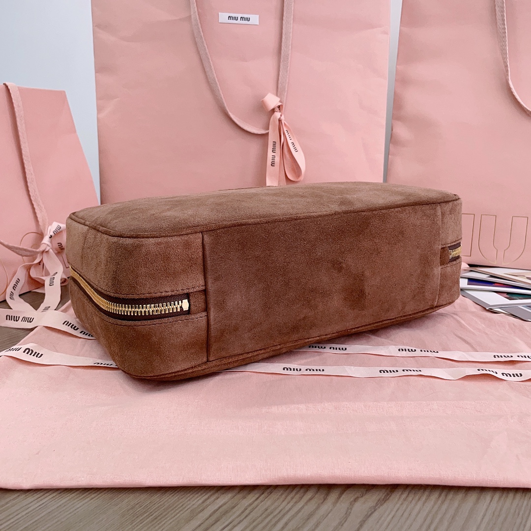 M*um*u leather top handbag-34x23x12cm