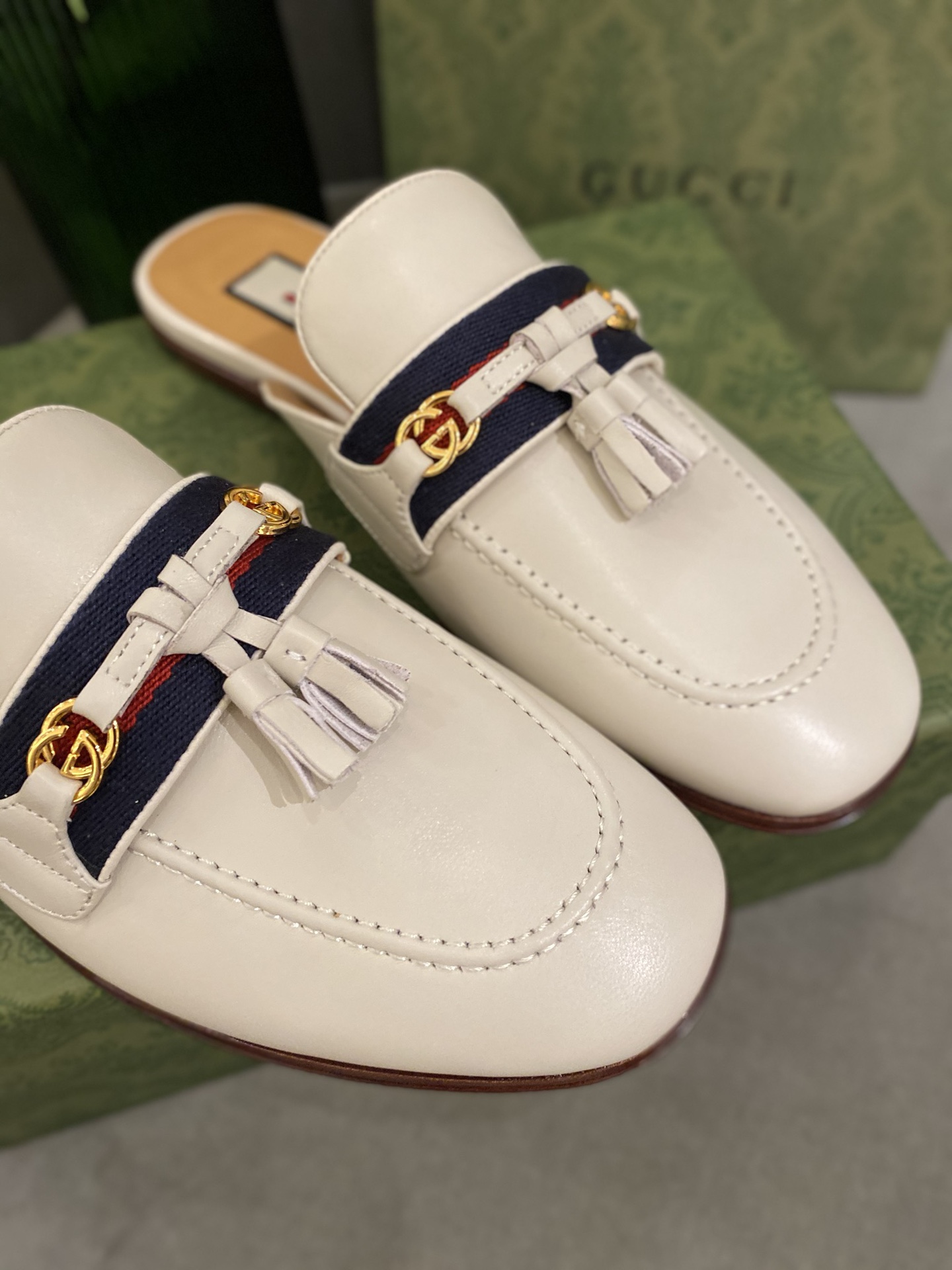 G*u*i loafers